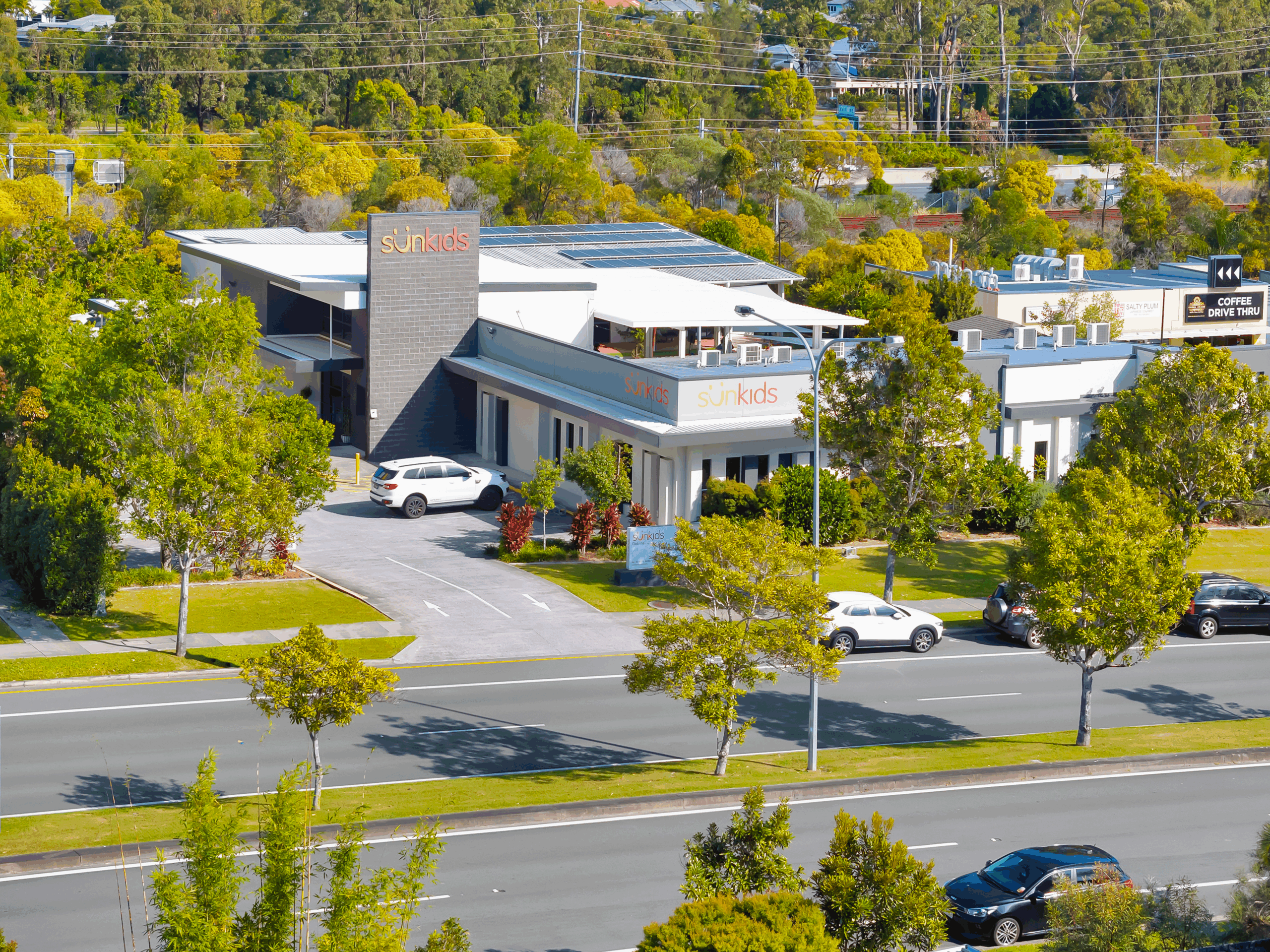 Young happy girl at Sunkids smiling