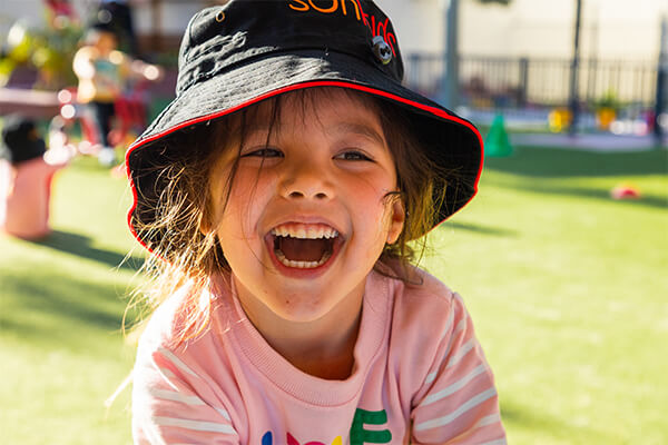 Sunkids-Section-HomePreciousTrust Young happy girl at Sunkids smiling